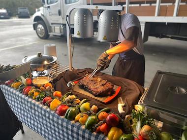 A screenshot of the Seasoned by Seymour catering website, a React-based platform built as a Revenue Engine.